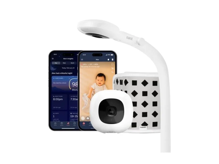 Nanit Pro smart baby monitor on a floor stand with the app